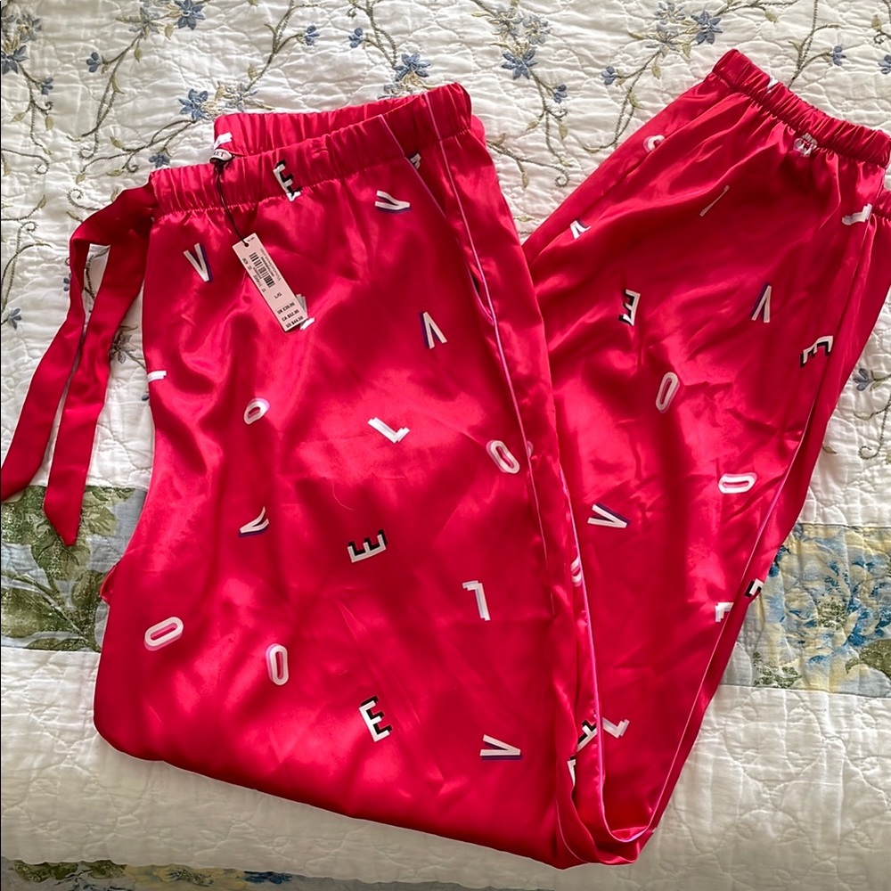 NWT Red silky Lounge Pants with letters spelling “LOVE”  Print